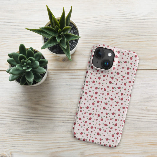 Strawberry pink iPhone case mockup with plants on table