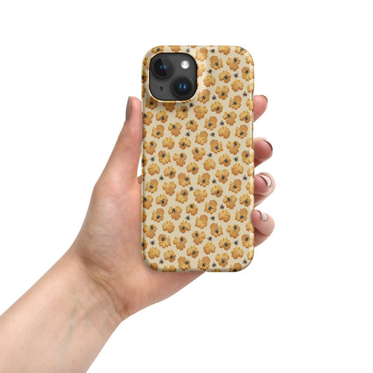 Yellow phone case with honeybee pattern being held